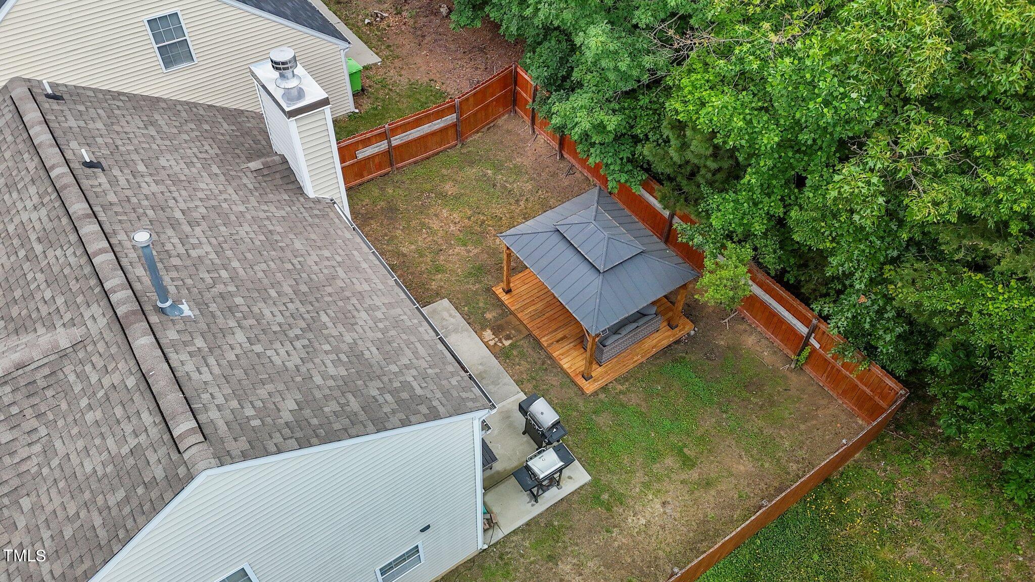 4232 Dalcross Road Raleigh, NC 27610 - Photo 37 of 38 swimming pool with a outdoor seating and trees