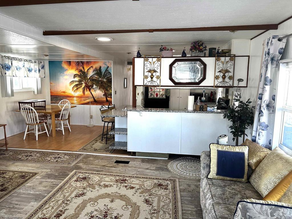 143 Swallow Lane Oceanside, CA 92057 - Photo 5 of 11 a room with gym equipment and view of kitchen appliances