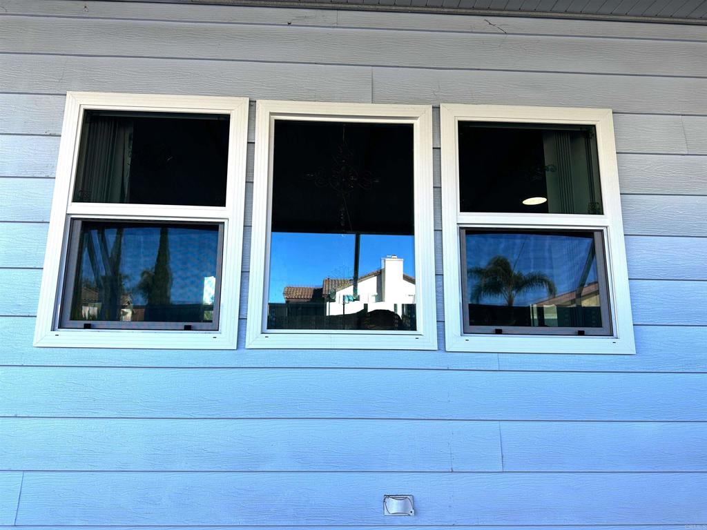 143 Swallow Lane Oceanside, CA 92057 - Photo 9 of 11 a view of fireplace and window