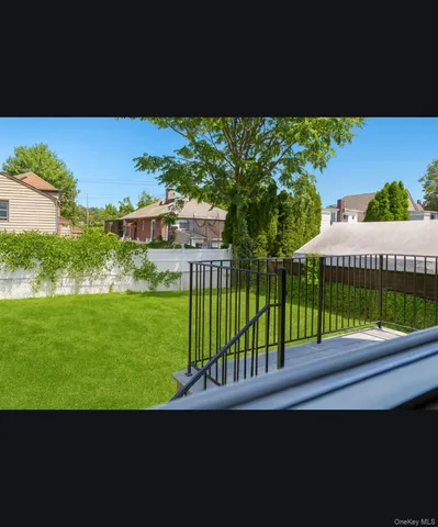 a view of a backyard and a garden