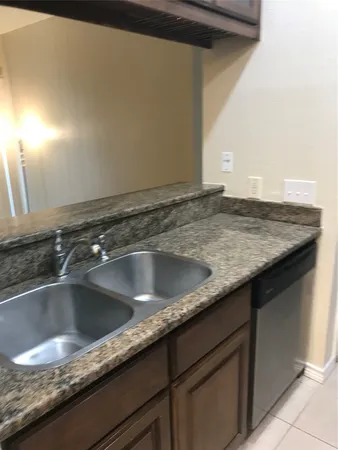 a view closeup a sink and cabinets