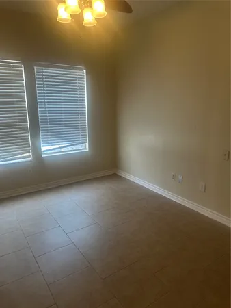 en empty room with windows