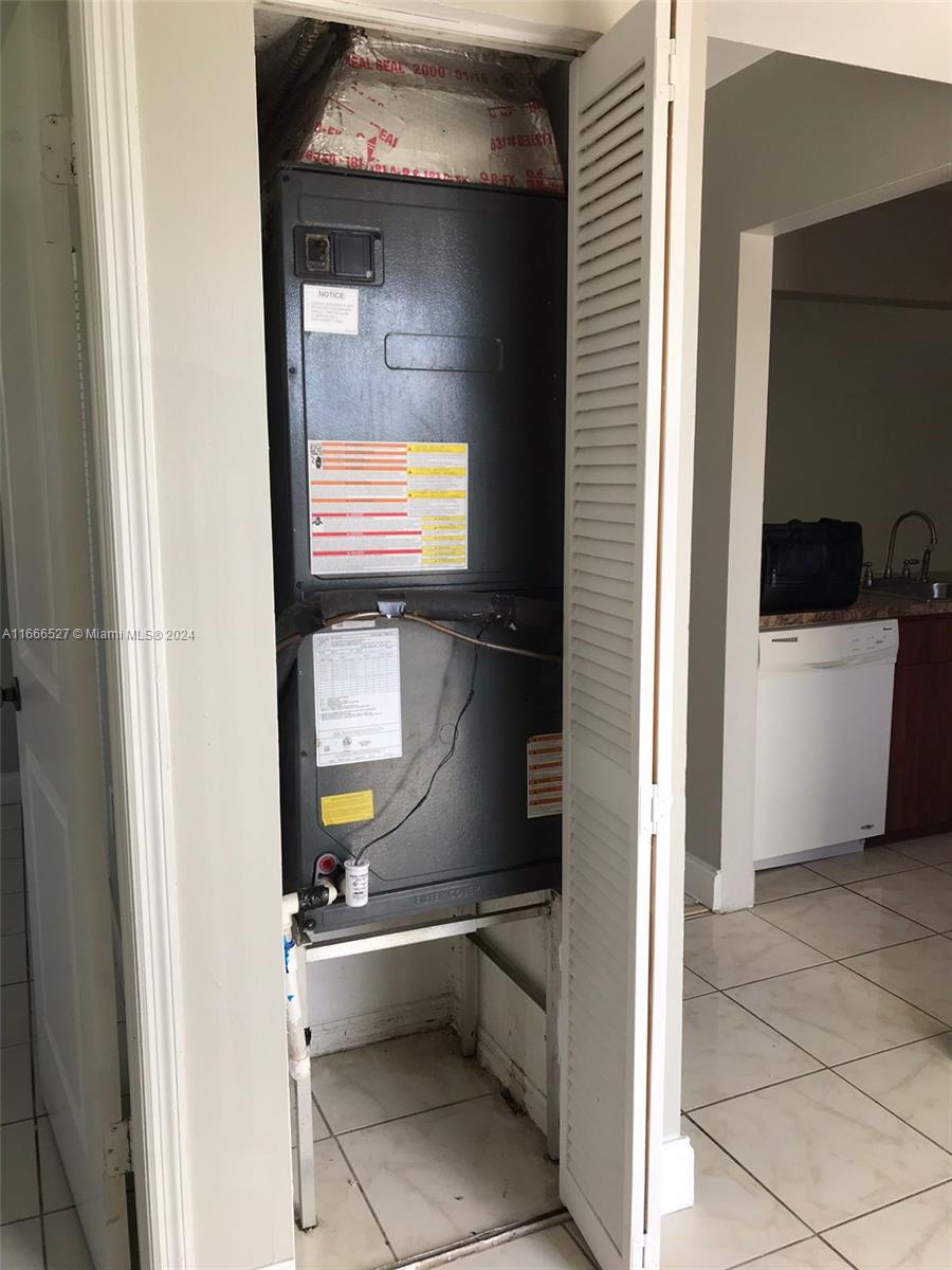 459 Northeast 210th Cir Terrace, Unit 20117 Miami, FL 33179 - Photo 14 of 33 a view of storage and utility