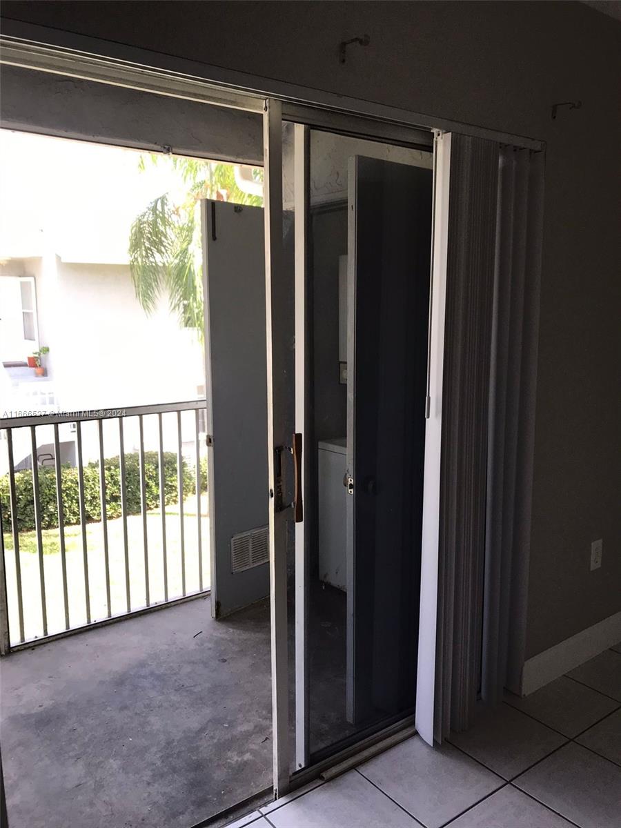 459 Northeast 210th Cir Terrace, Unit 20117 Miami, FL 33179 - Photo 24 of 33 a view of a balcony