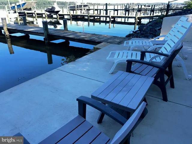 a view of a living room and dining room