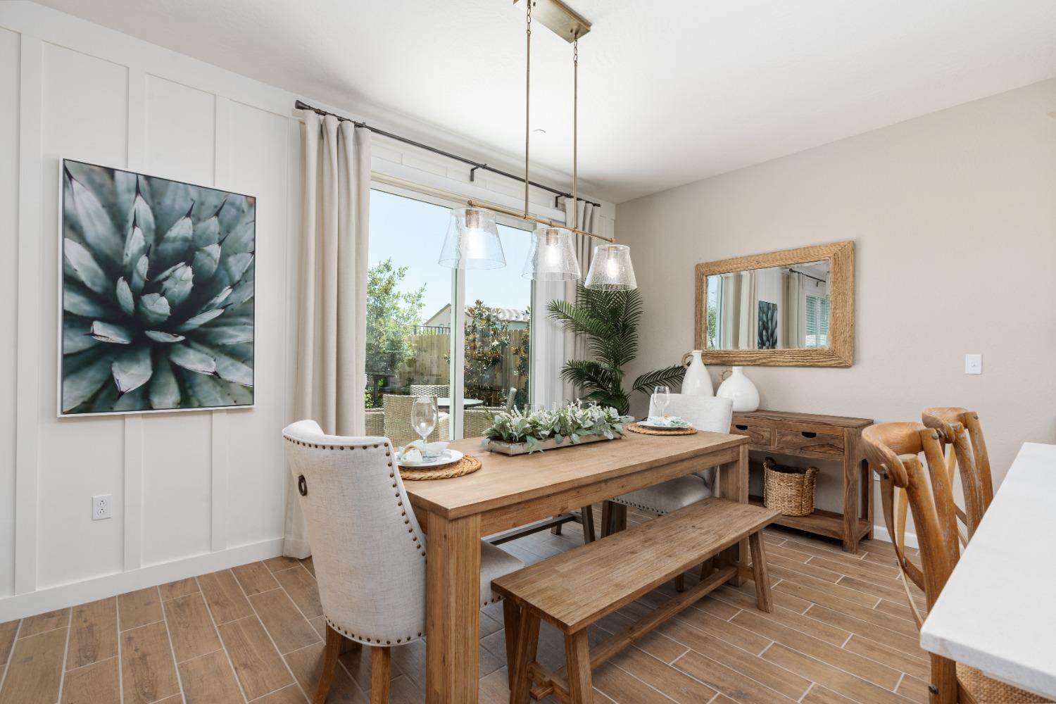 1167 Elevations Way West Madera, CA 93636 - Photo 13 of 28 a view of a dining room with furniture window and outside view