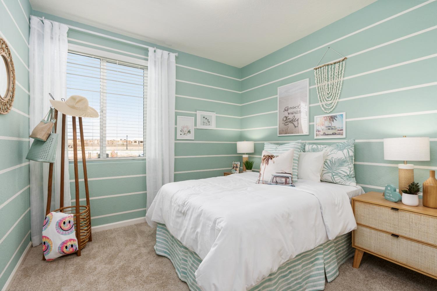 1167 Elevations Way West Madera, CA 93636 - Photo 14 of 28 a bedroom with a bed and a window