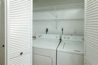 a utility room with dryer and washer