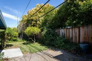 a view of backyard with green space