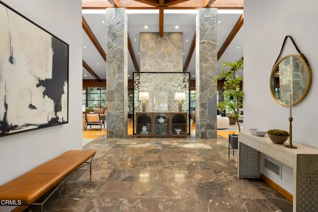 a outdoor living space with furniture and a fireplace