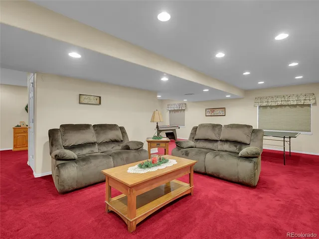 a living room with furniture and a couch