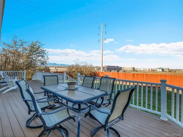 a view of a balcony with lake view and mountain view