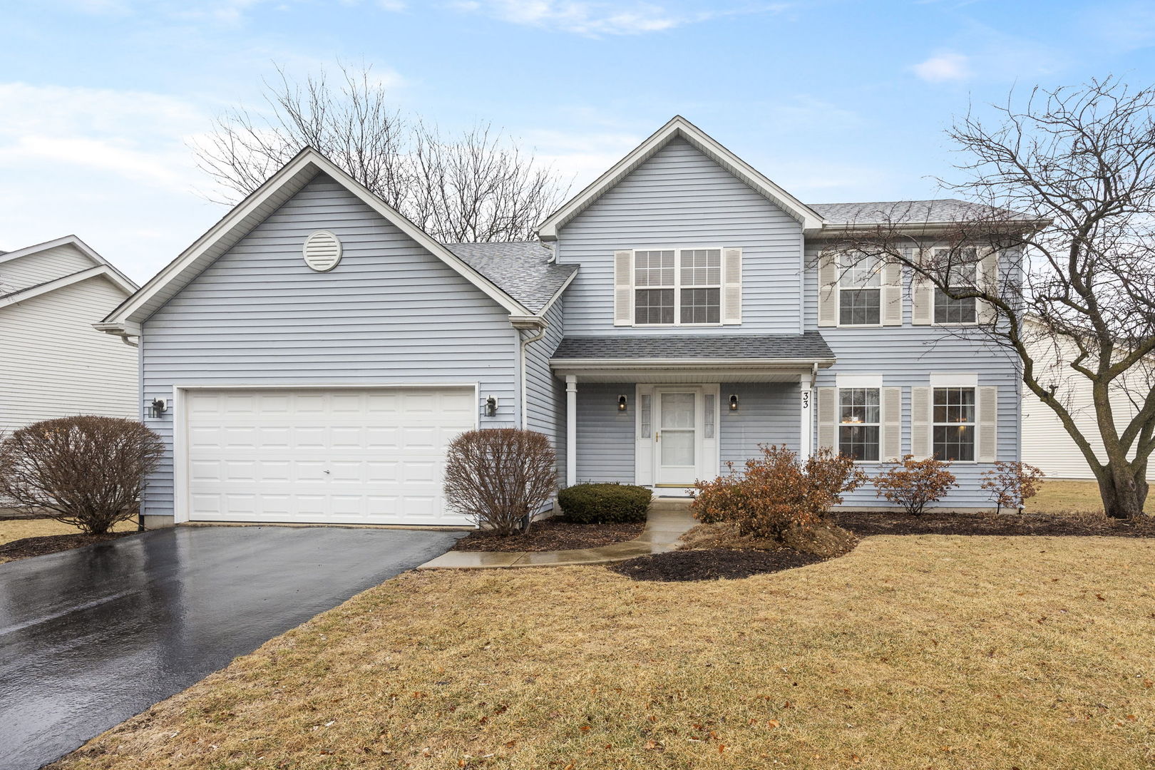 33 Forestview Lane Aurora, IL 60502 - Photo 1 of 27 a front view of a house with garden