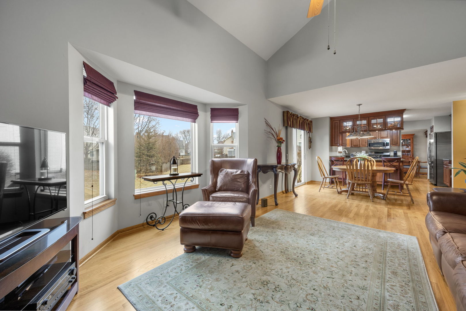 33 Forestview Lane Aurora, IL 60502 - Photo 13 of 27 a living room with furniture and a flat screen tv