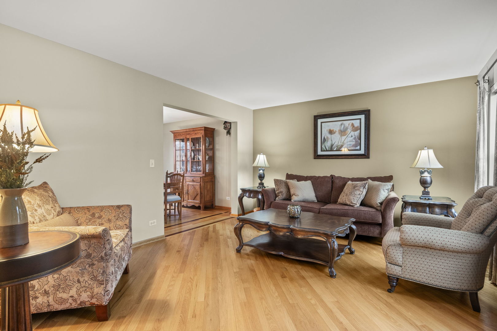 33 Forestview Lane Aurora, IL 60502 - Photo 3 of 27 a living room with furniture and wooden floor