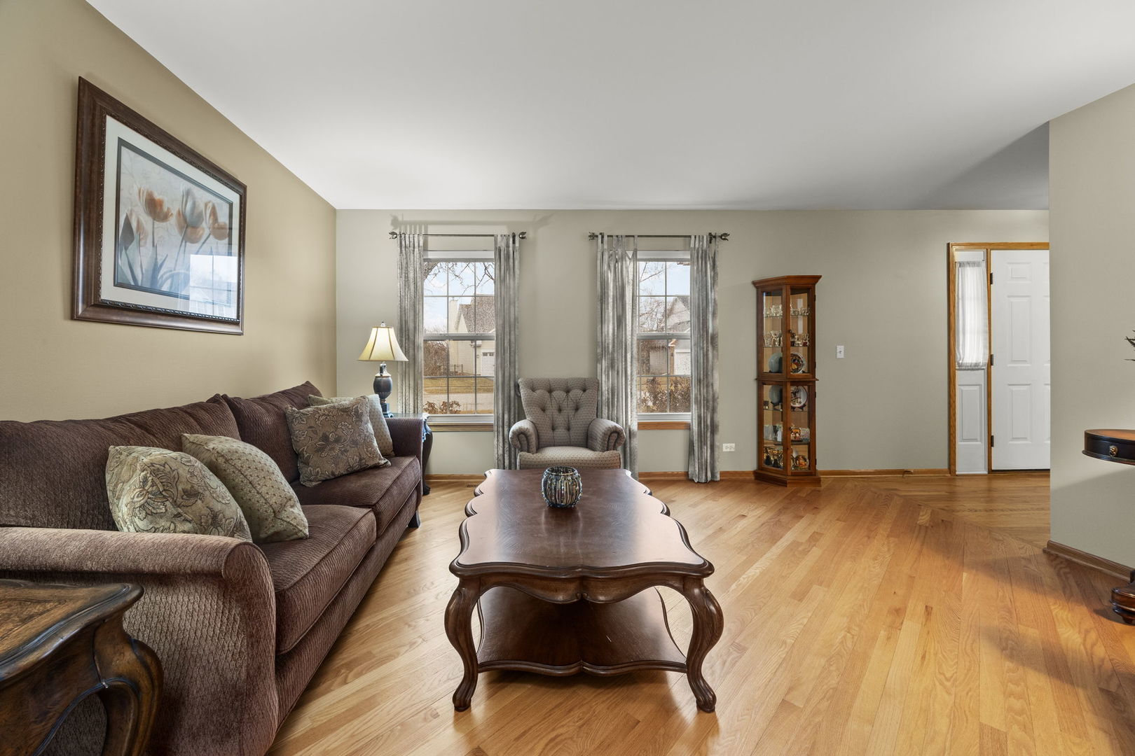 33 Forestview Lane Aurora, IL 60502 - Photo 4 of 27 a living room with furniture and a large window