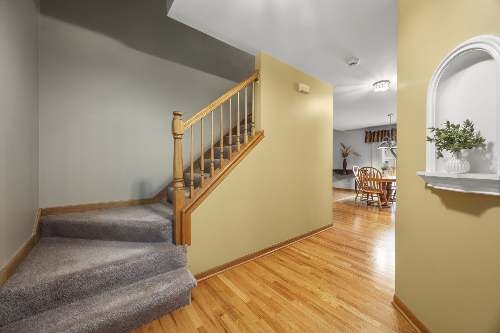33 Forestview Lane Aurora, IL 60502 - Photo 6 of 27 a view of entryway and hall with wooden floor