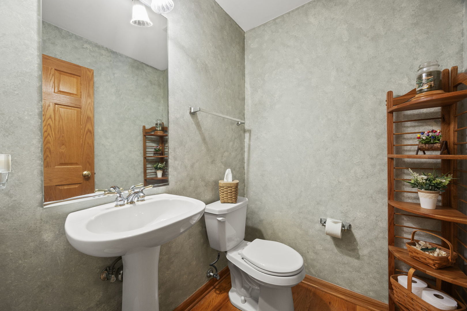 33 Forestview Lane Aurora, IL 60502 - Photo 7 of 27 a bathroom with a sink a toilet and a mirror