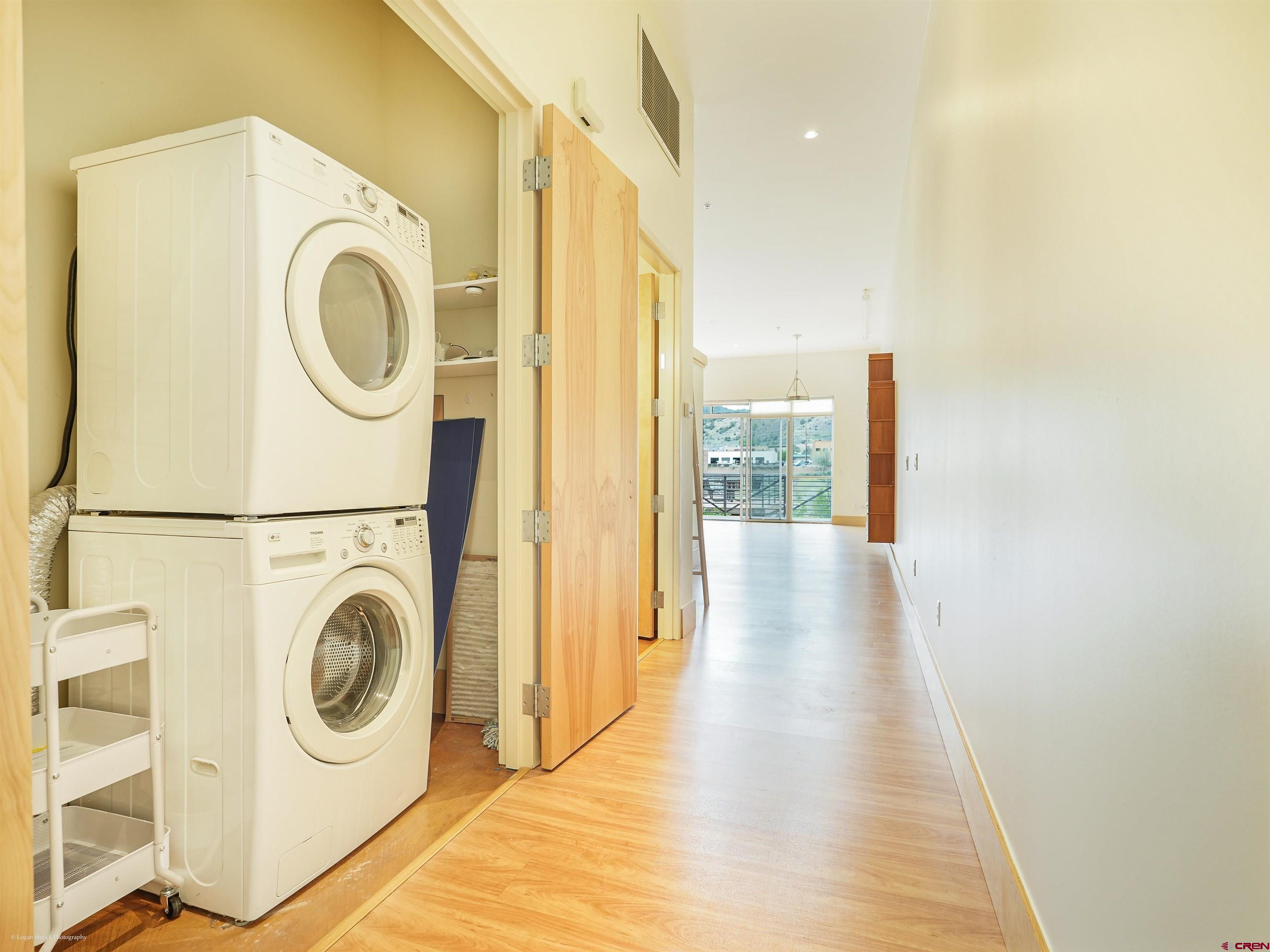 555 Rivergate Lane, Unit B2139 Durango, CO 81301 - Photo 27 of 32 a view of a hallway with washer and dryer