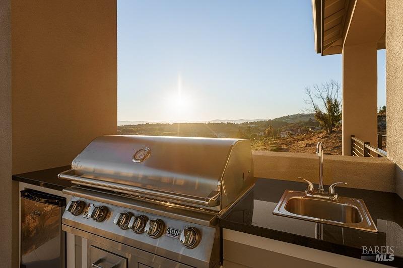 3642 Bellagio Court Santa Rosa, CA 95404 - Photo 20 of 54 Look at this sweet outdoor kitchen with refrigerator, sink and oversized stainless BBQ/Grill. Entertaining as you watch the sunsets.