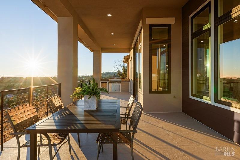 3642 Bellagio Court Santa Rosa, CA 95404 - Photo 21 of 54 Just look at the size of this main level covered loggia. This view is from the area where you access from the great room with fireplace. And the forever changing sunsets!