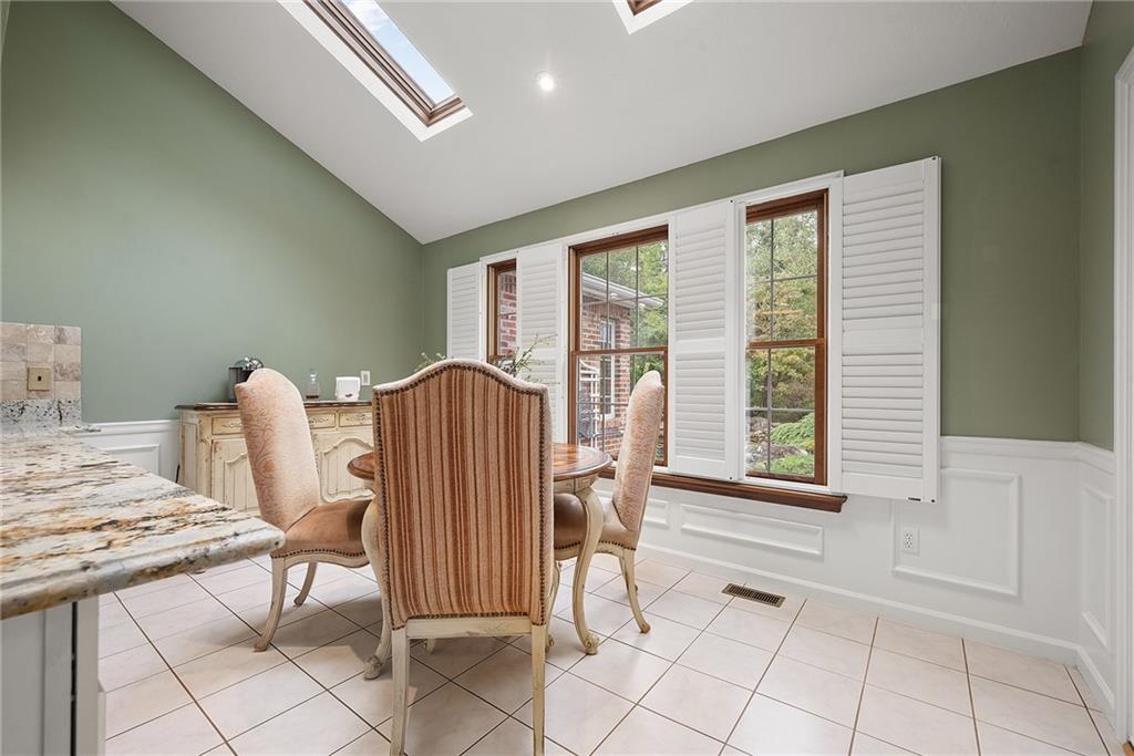 2779 Clearview Road Allison Park, PA 15101 - Photo 11 of 49 Light-filled breakfast area with skylights and views of the backyard.