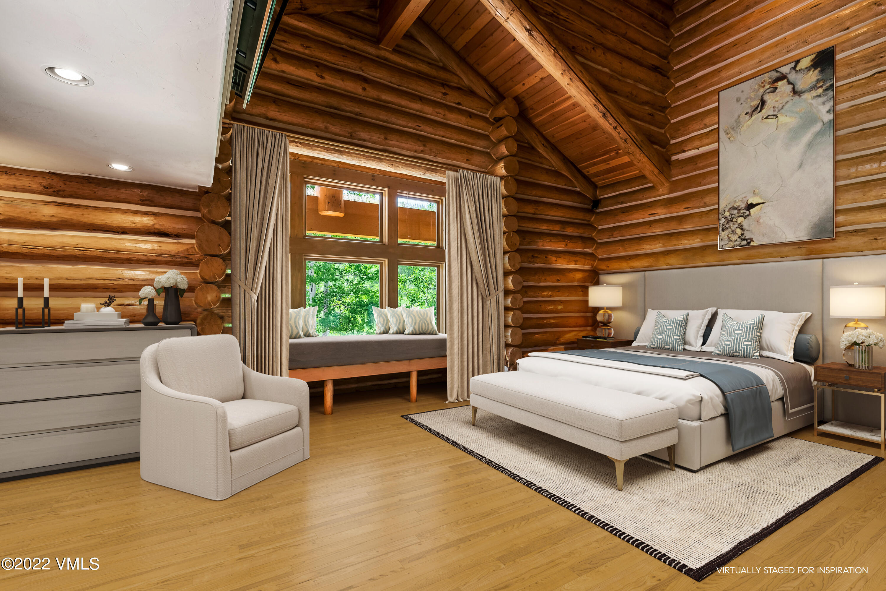 447 Borders Road Beaver Creek, CO 81620 - Photo 16 of 71 a spacious bedroom with a bed and a couch