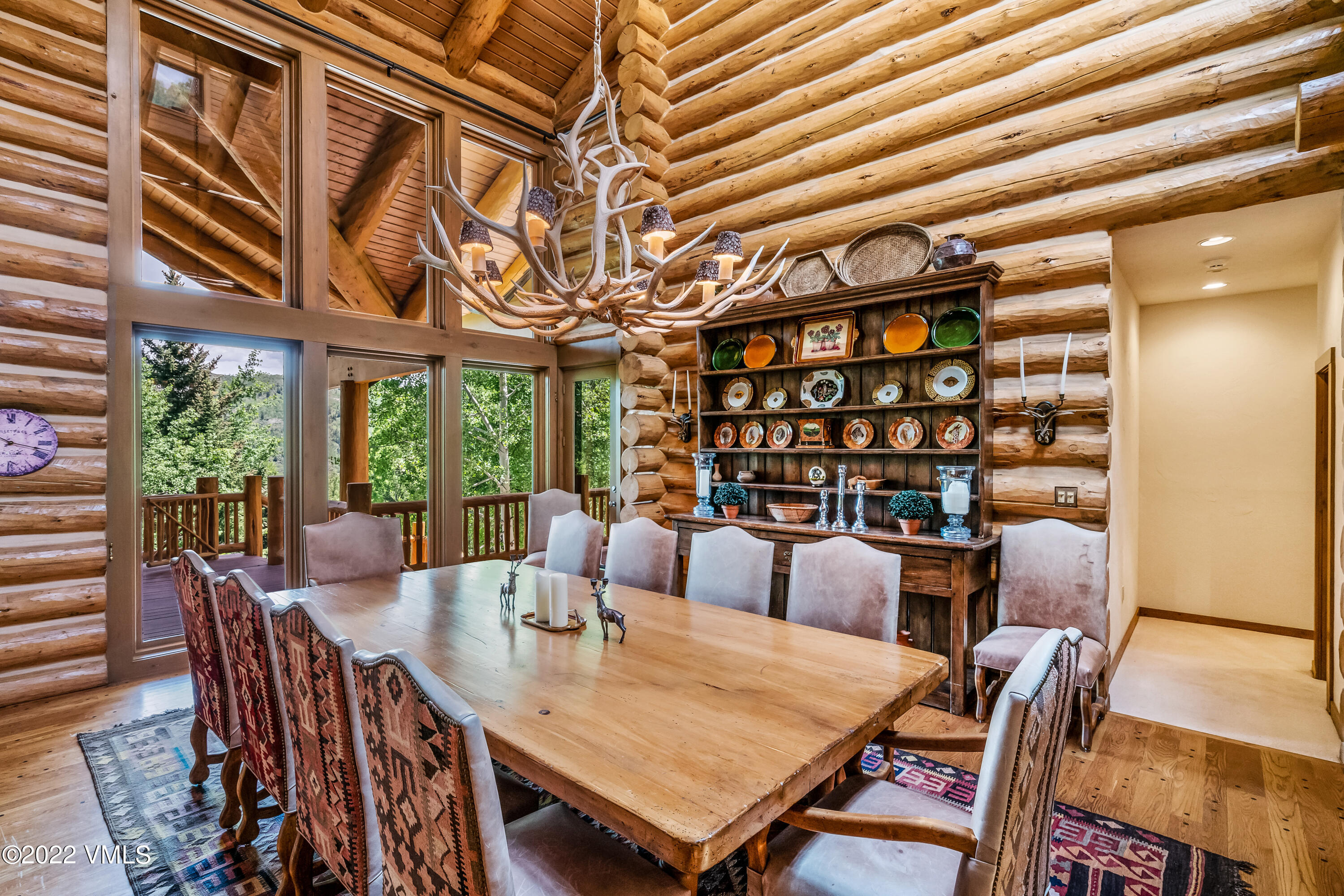447 Borders Road Beaver Creek, CO 81620 - Photo 19 of 71 a view of a dining room with furniture window and outside view