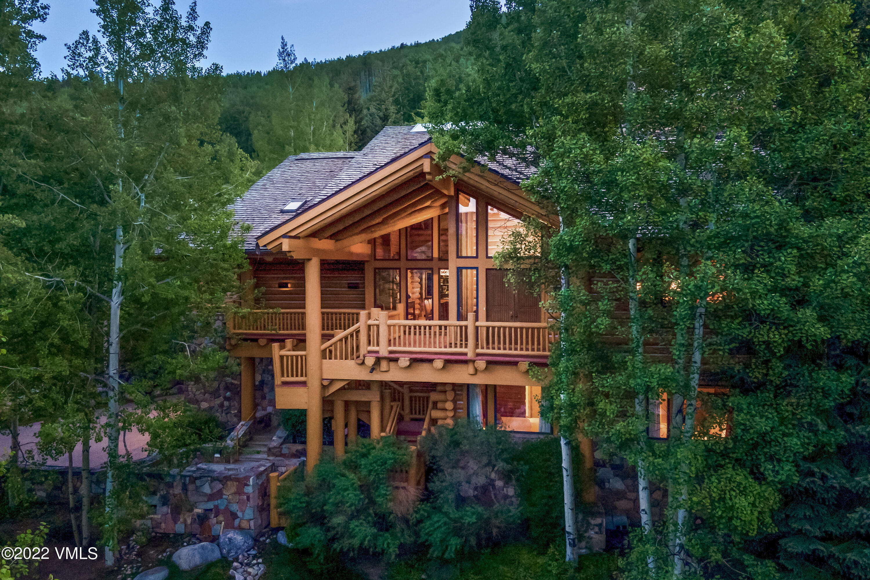 447 Borders Road Beaver Creek, CO 81620 - Photo 2 of 71 a view of a house with a yard
