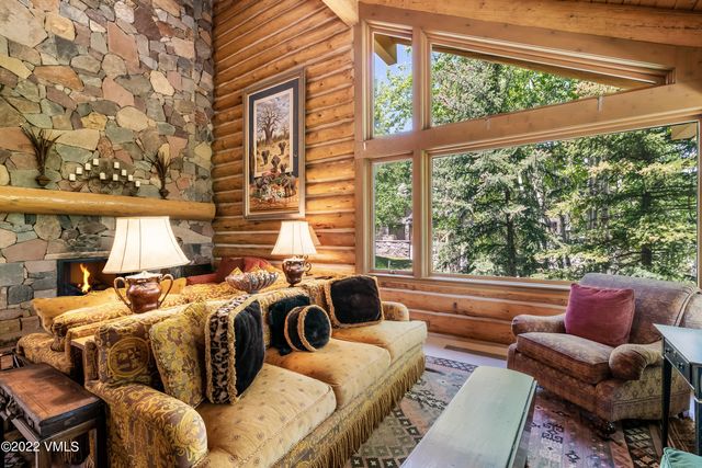 a kitchen with stainless steel appliances granite countertop sink stove and cabinets
