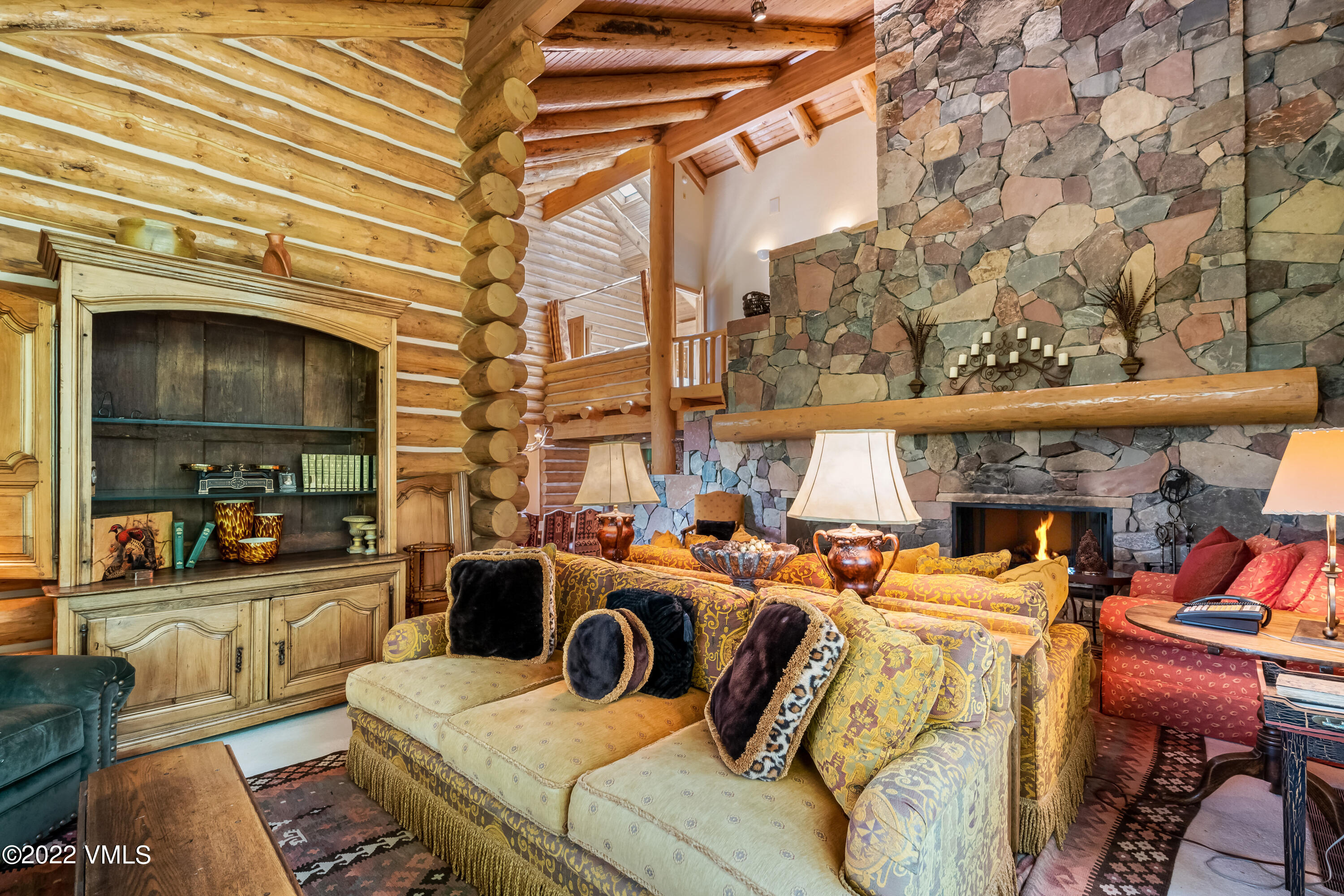 447 Borders Road Beaver Creek, CO 81620 - Photo 23 of 71 a view of a livingroom with furniture and a fireplace