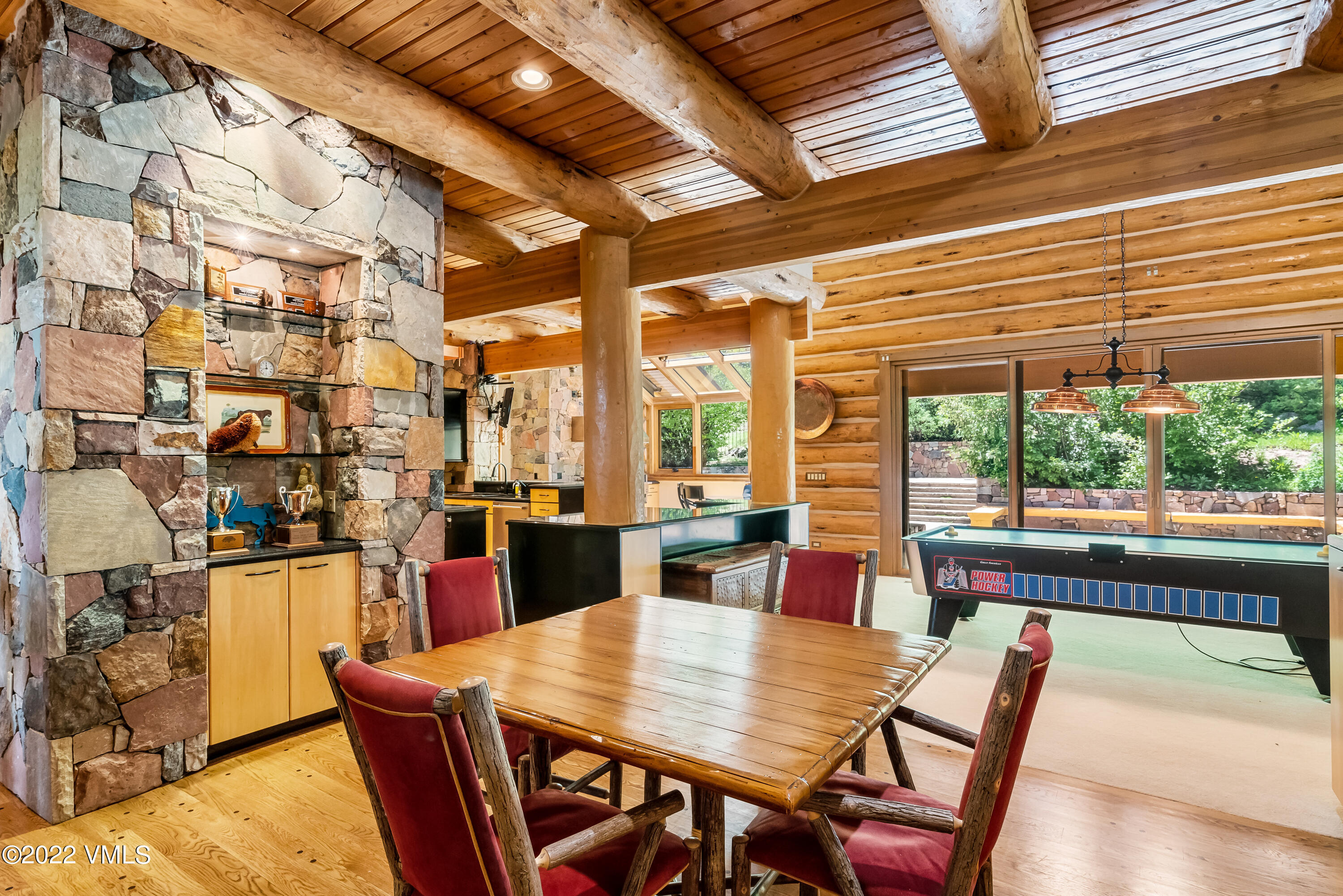 447 Borders Road Beaver Creek, CO 81620 - Photo 29 of 71 a view of a dining room with furniture window and outside view