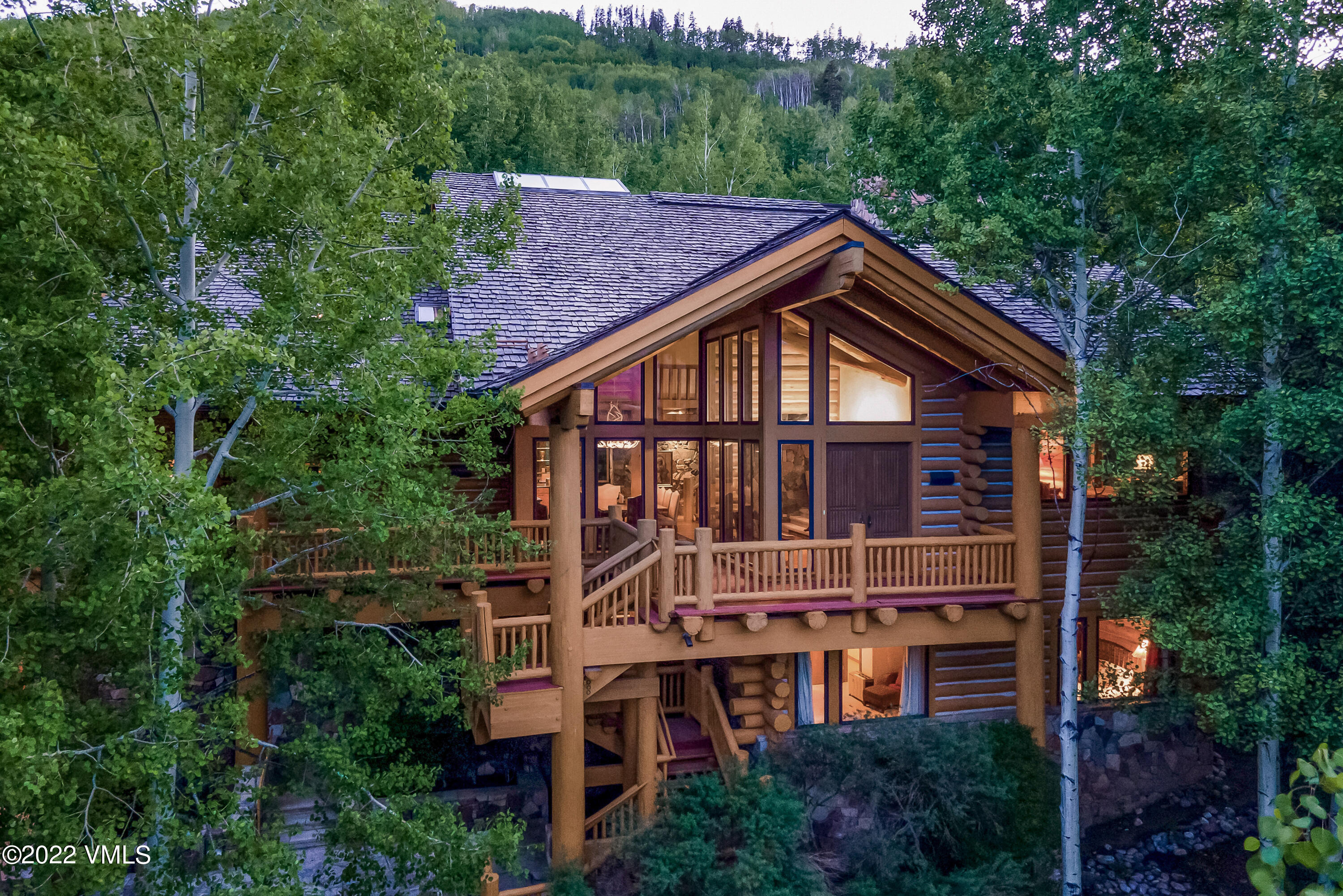 447 Borders Road Beaver Creek, CO 81620 - Photo 3 of 71 a view of a house with brick walls and plants