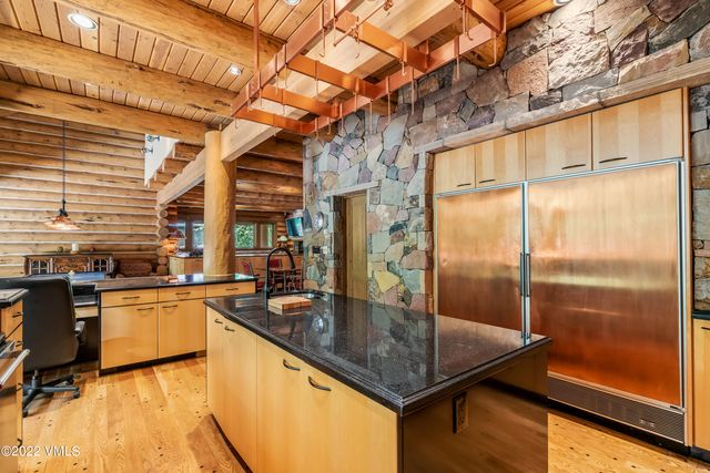 a front view of house with yard outdoor seating and barbeque oven