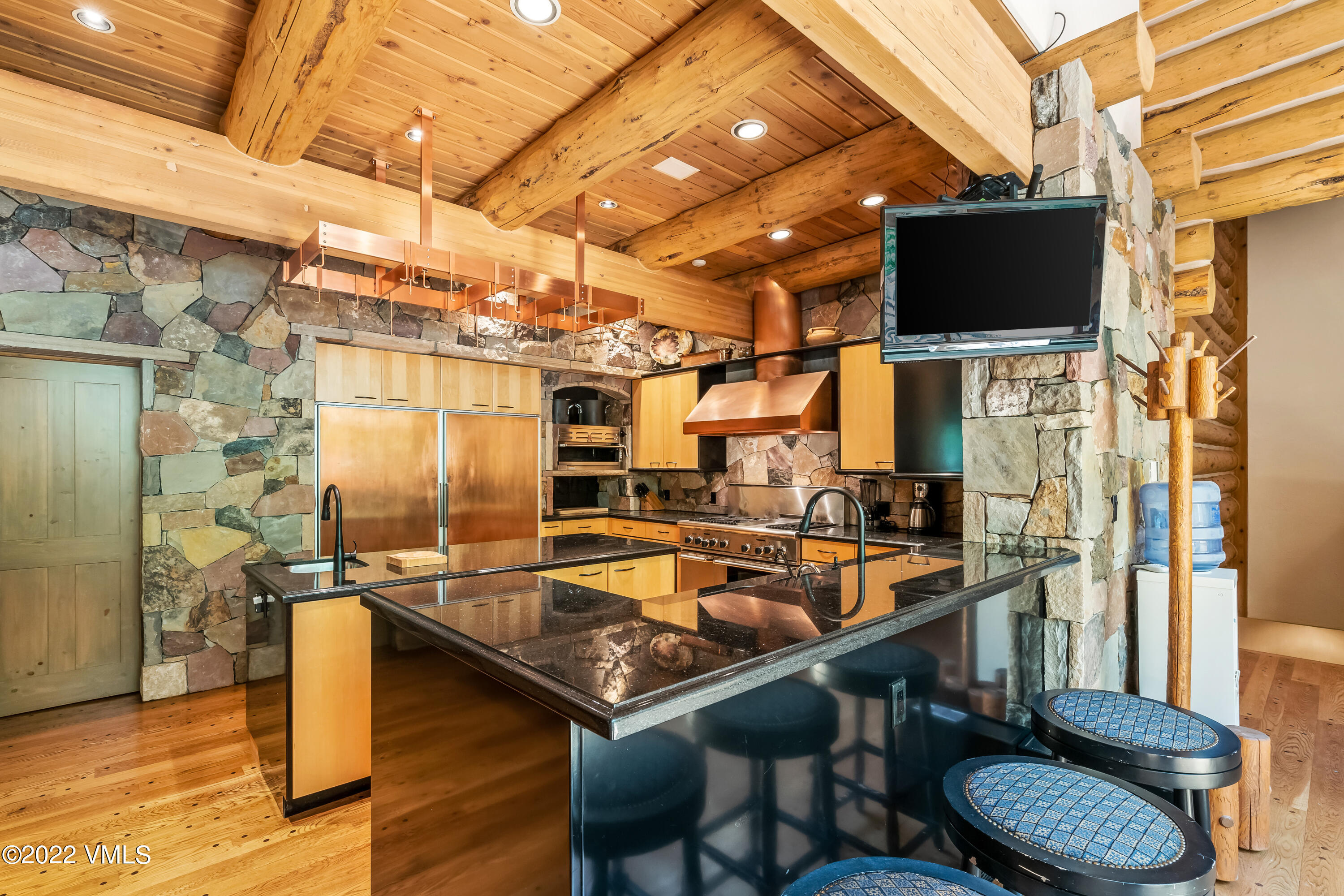 447 Borders Road Beaver Creek, CO 81620 - Photo 33 of 71 a outdoor dining space with furniture and flat screen tv