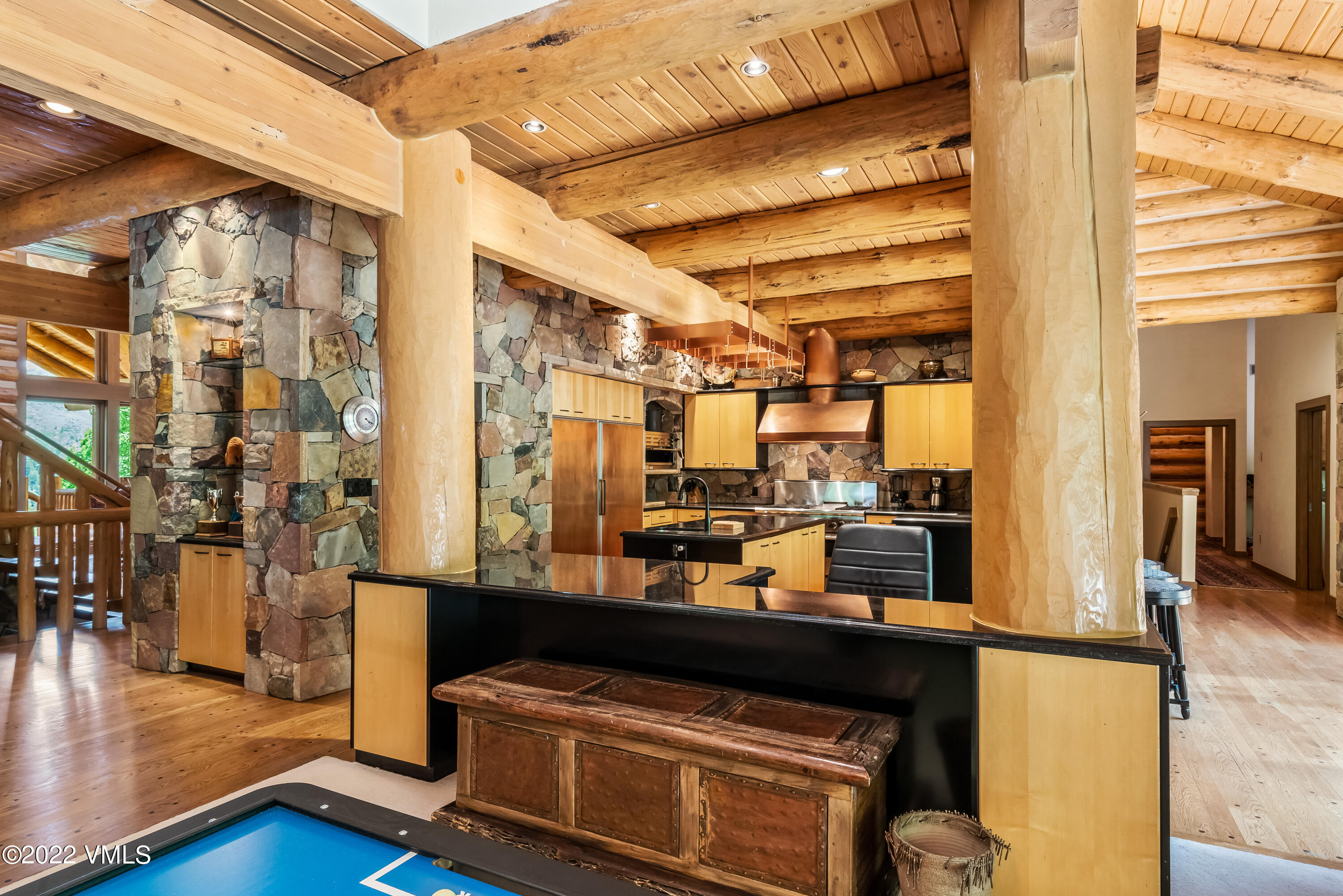 447 Borders Road Beaver Creek, CO 81620 - Photo 35 of 71 a view of a living room with furniture and a kitchen view