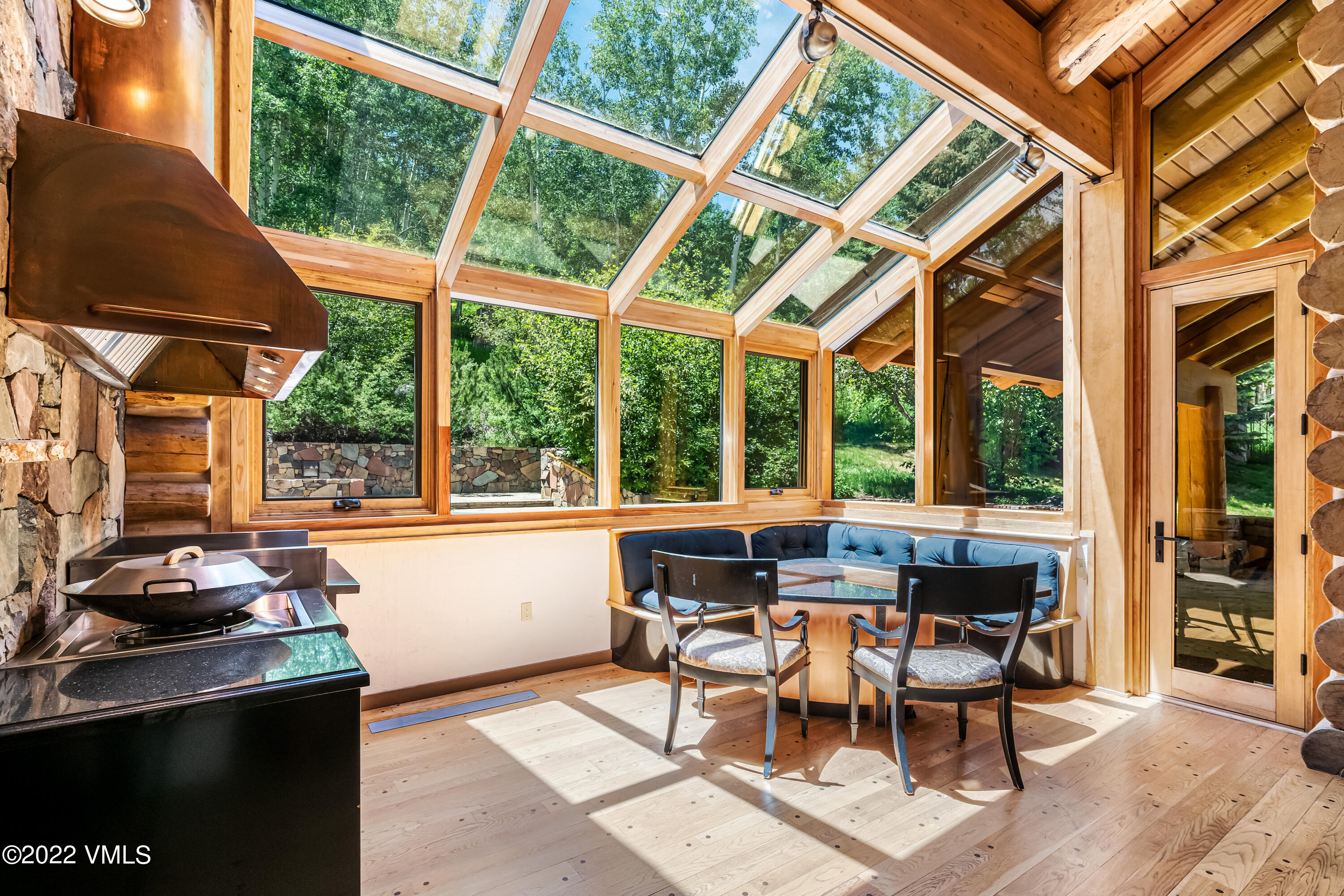 447 Borders Road Beaver Creek, CO 81620 - Photo 38 of 71 a view of a dining room with furniture window and outside view