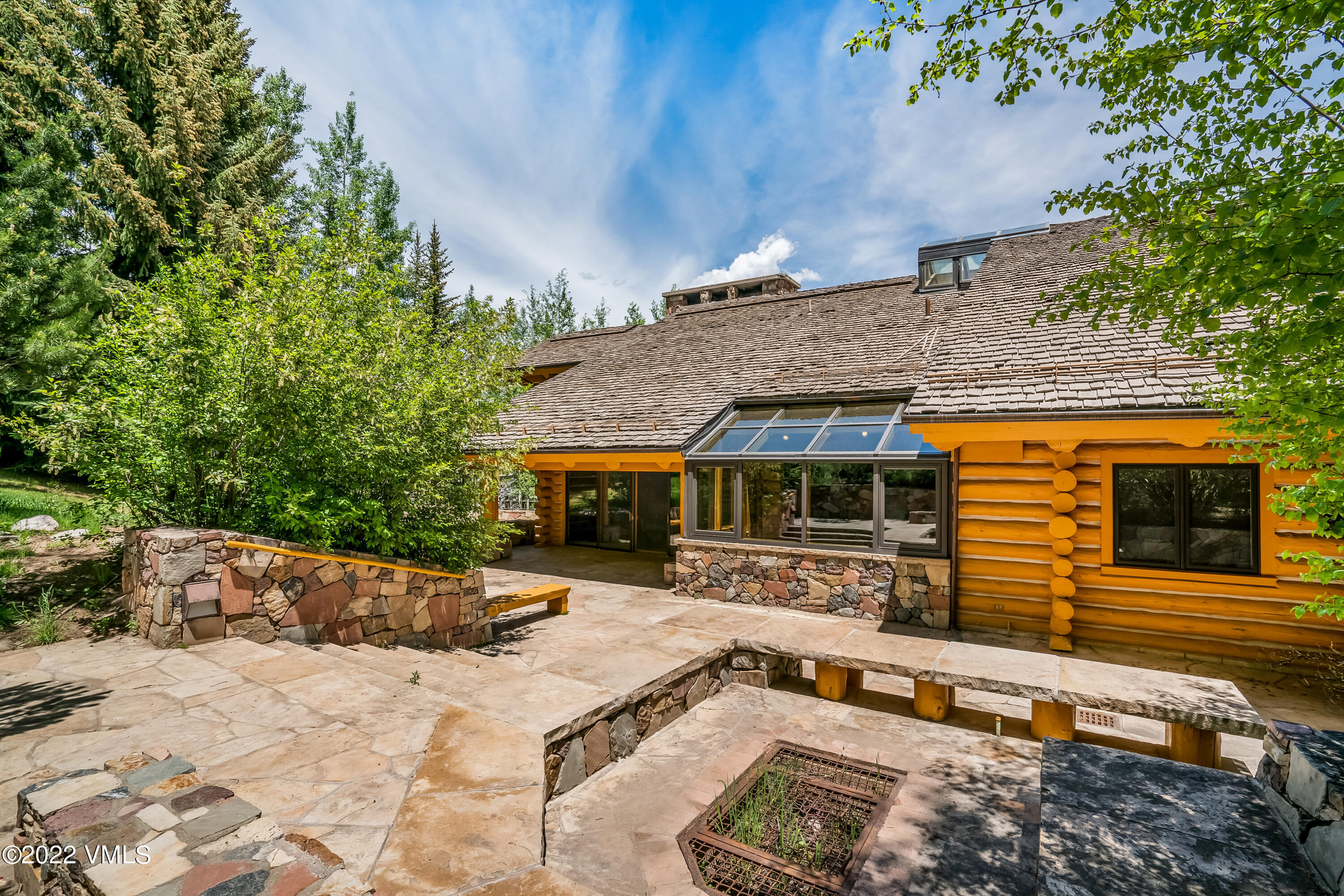 447 Borders Road Beaver Creek, CO 81620 - Photo 41 of 71 a front view of house with yard outdoor seating and barbeque oven