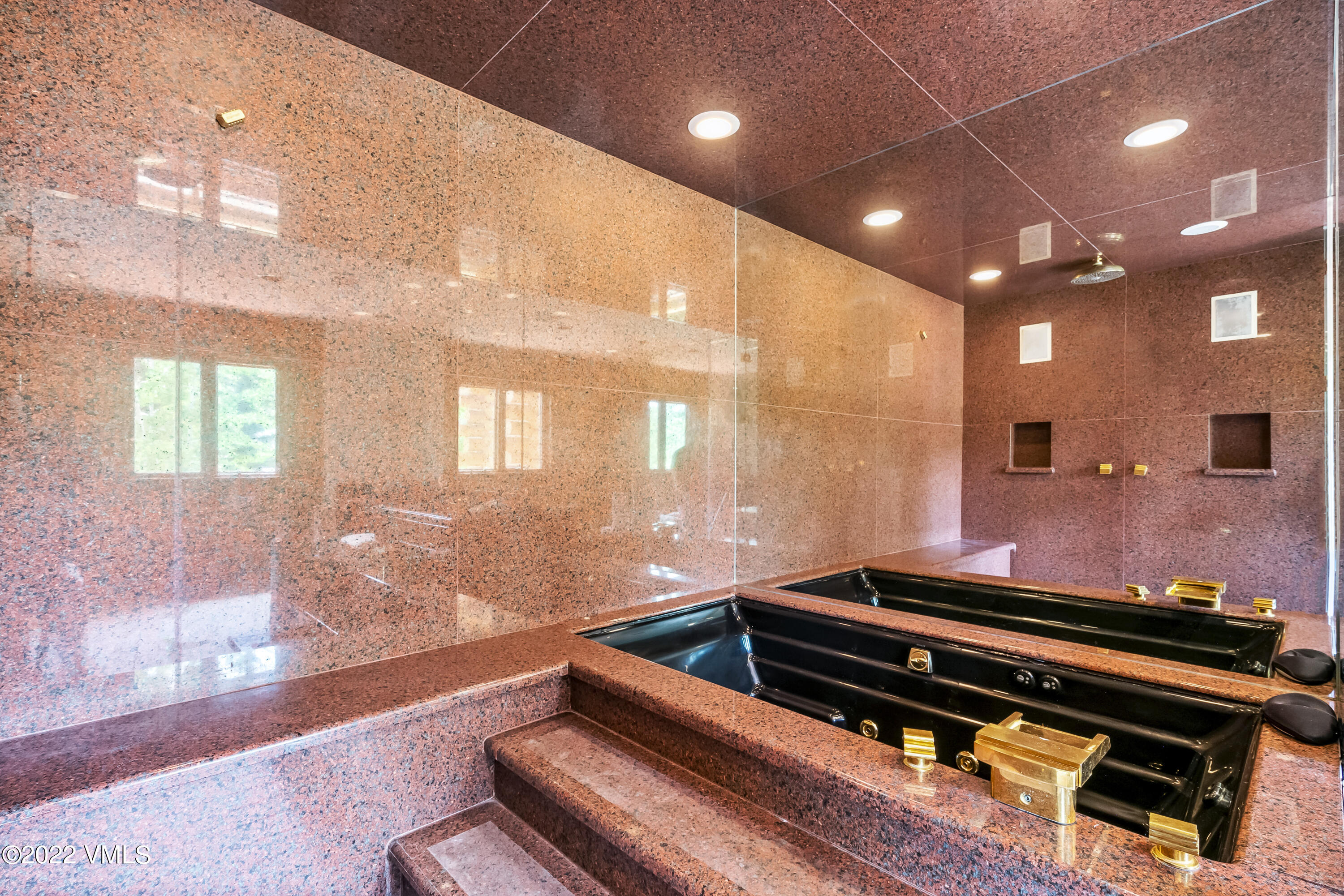 447 Borders Road Beaver Creek, CO 81620 - Photo 43 of 71 a sitting area with wooden racks