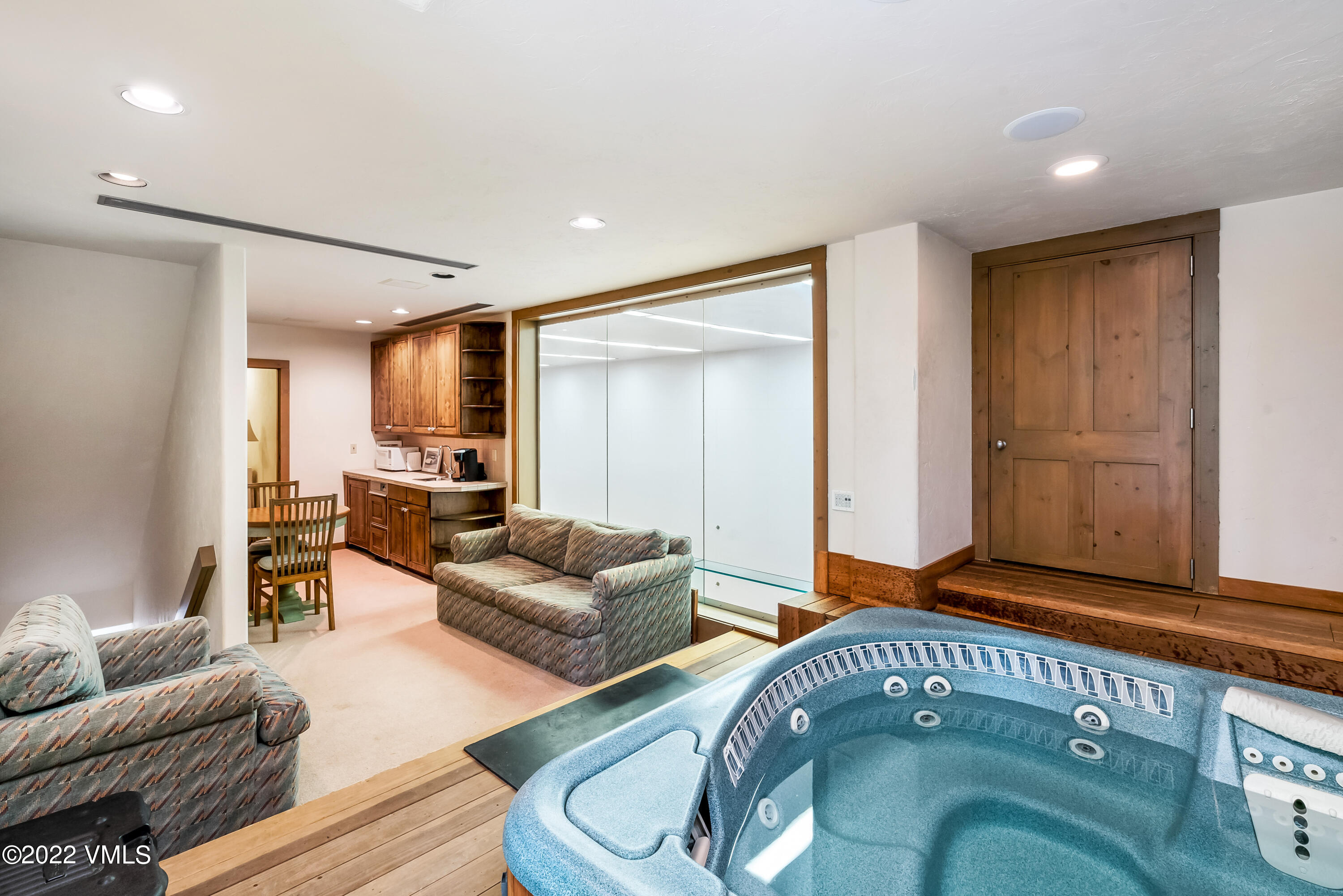 447 Borders Road Beaver Creek, CO 81620 - Photo 46 of 71 a living room with furniture and a window
