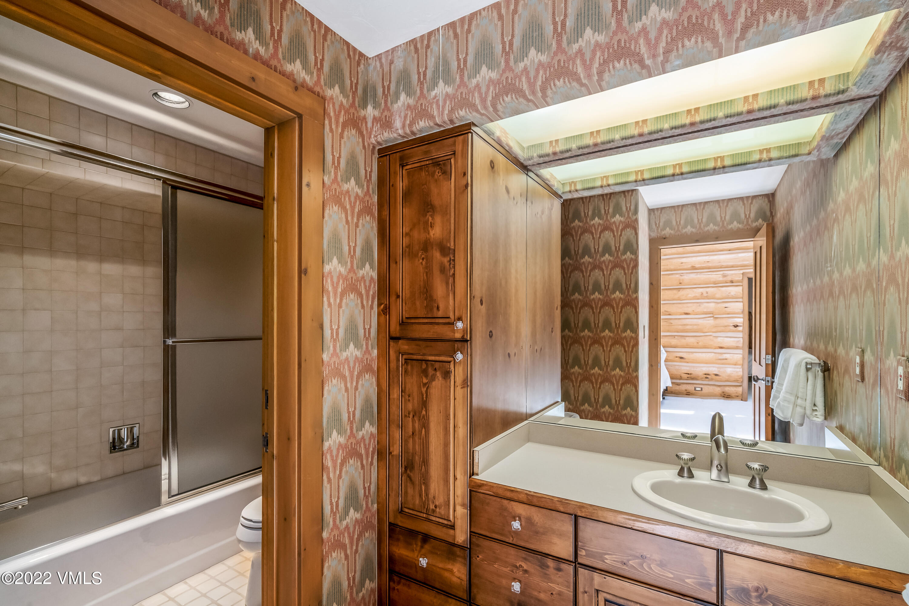 447 Borders Road Beaver Creek, CO 81620 - Photo 51 of 71 a bathroom with a sink and a mirror