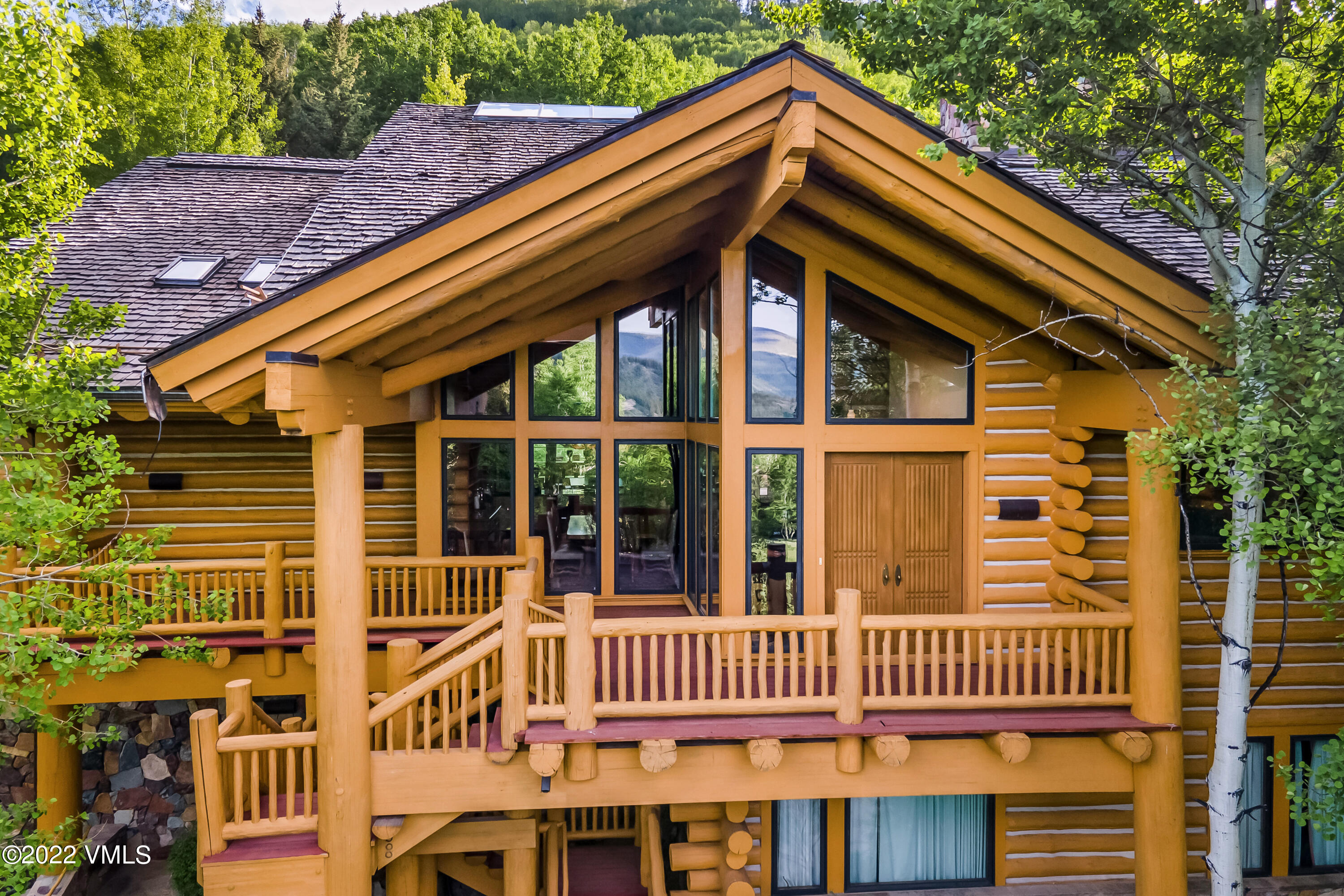 447 Borders Road Beaver Creek, CO 81620 - Photo 65 of 71 a front view of a house with a deck