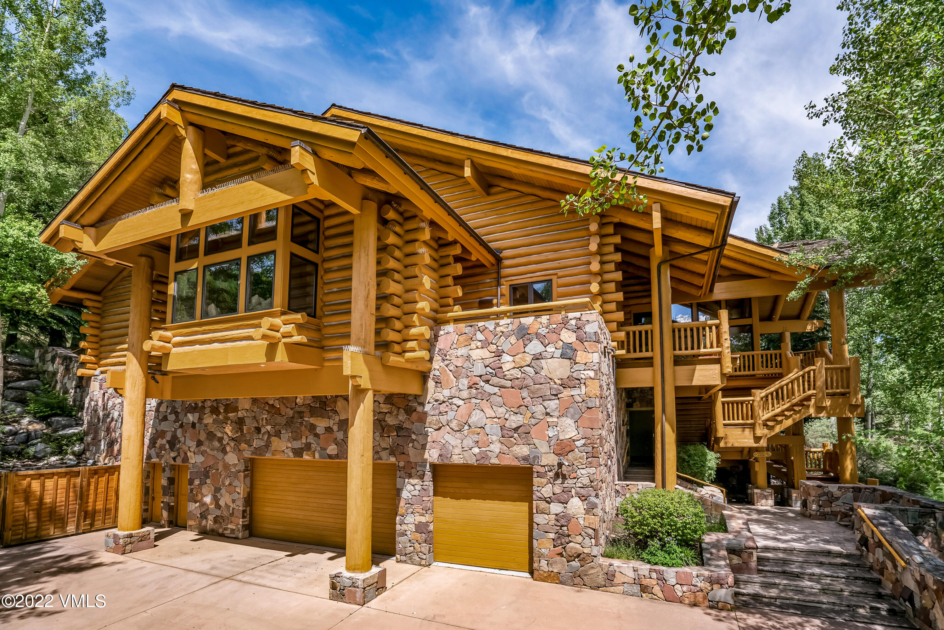 447 Borders Road Beaver Creek, CO 81620 - Photo 66 of 71 front view of a house with a street