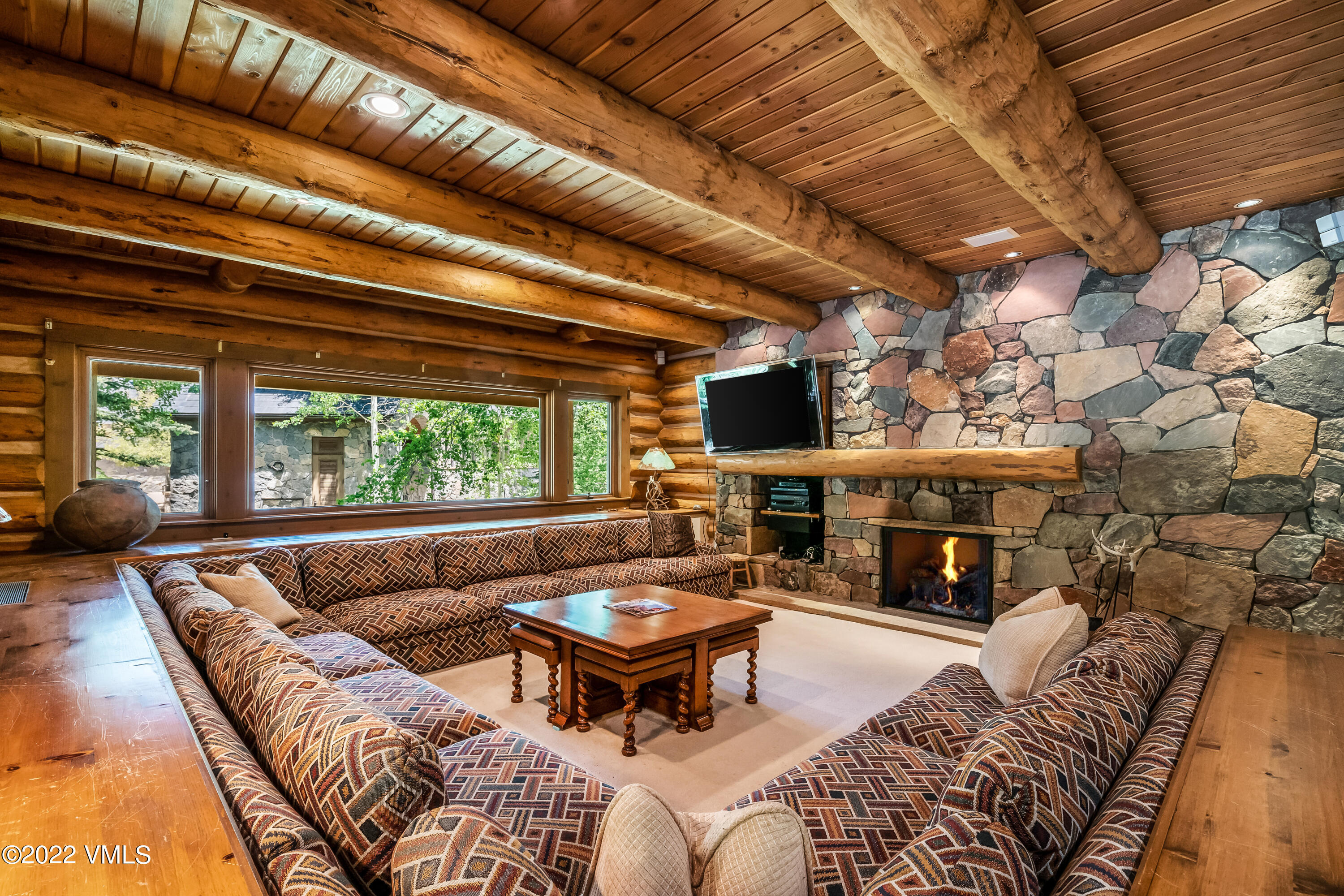 447 Borders Road Beaver Creek, CO 81620 - Photo 9 of 71 a living room with furniture and a fireplace