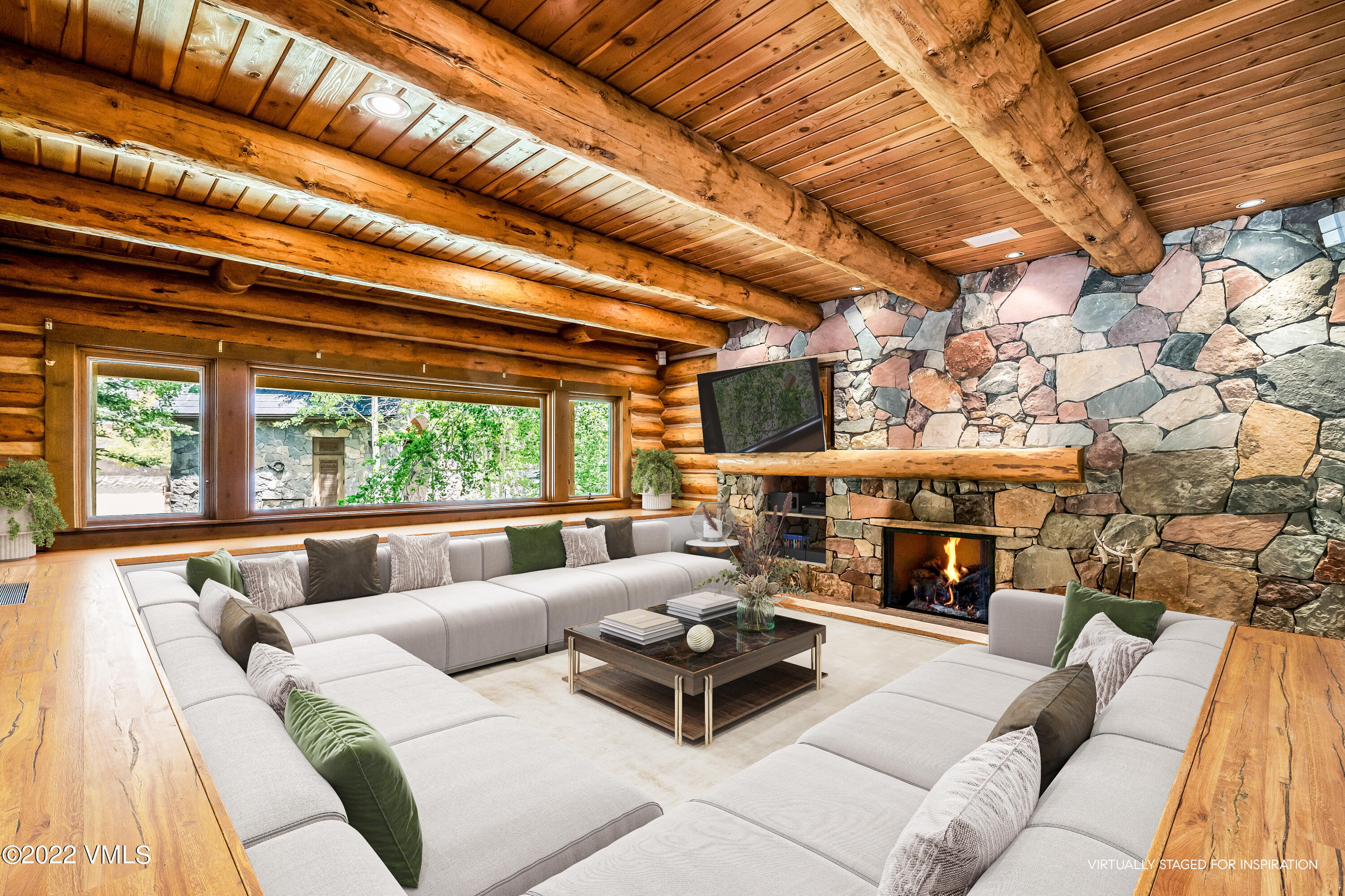 447 Borders Road Beaver Creek, CO 81620 - Photo 10 of 71 a living room with furniture and a fireplace