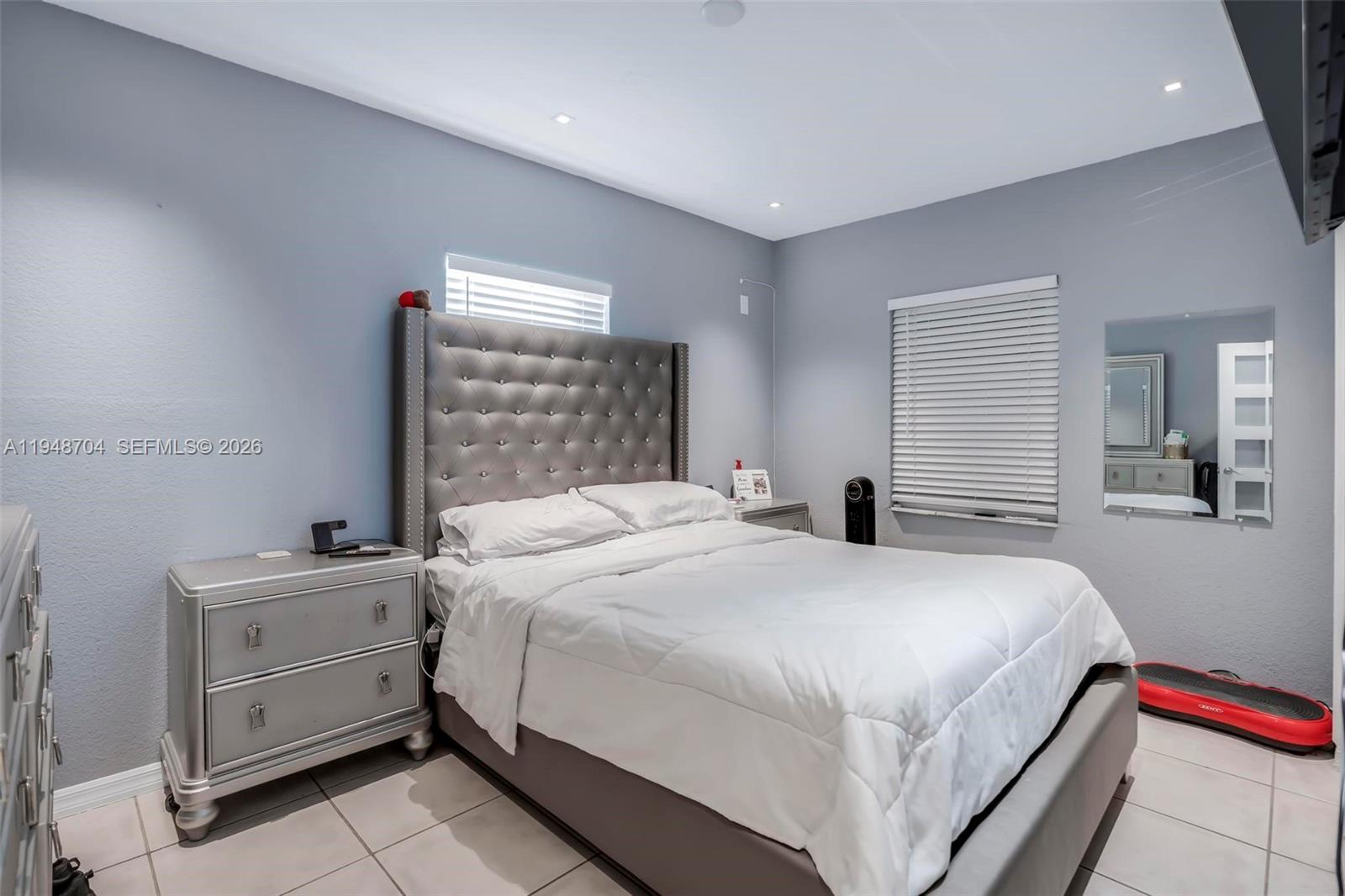 14860 Buchanan Street Miami, FL 33176 - Photo 14 of 27 a bedroom with a bed and a window