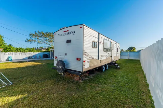 a view of a backyard with a garden