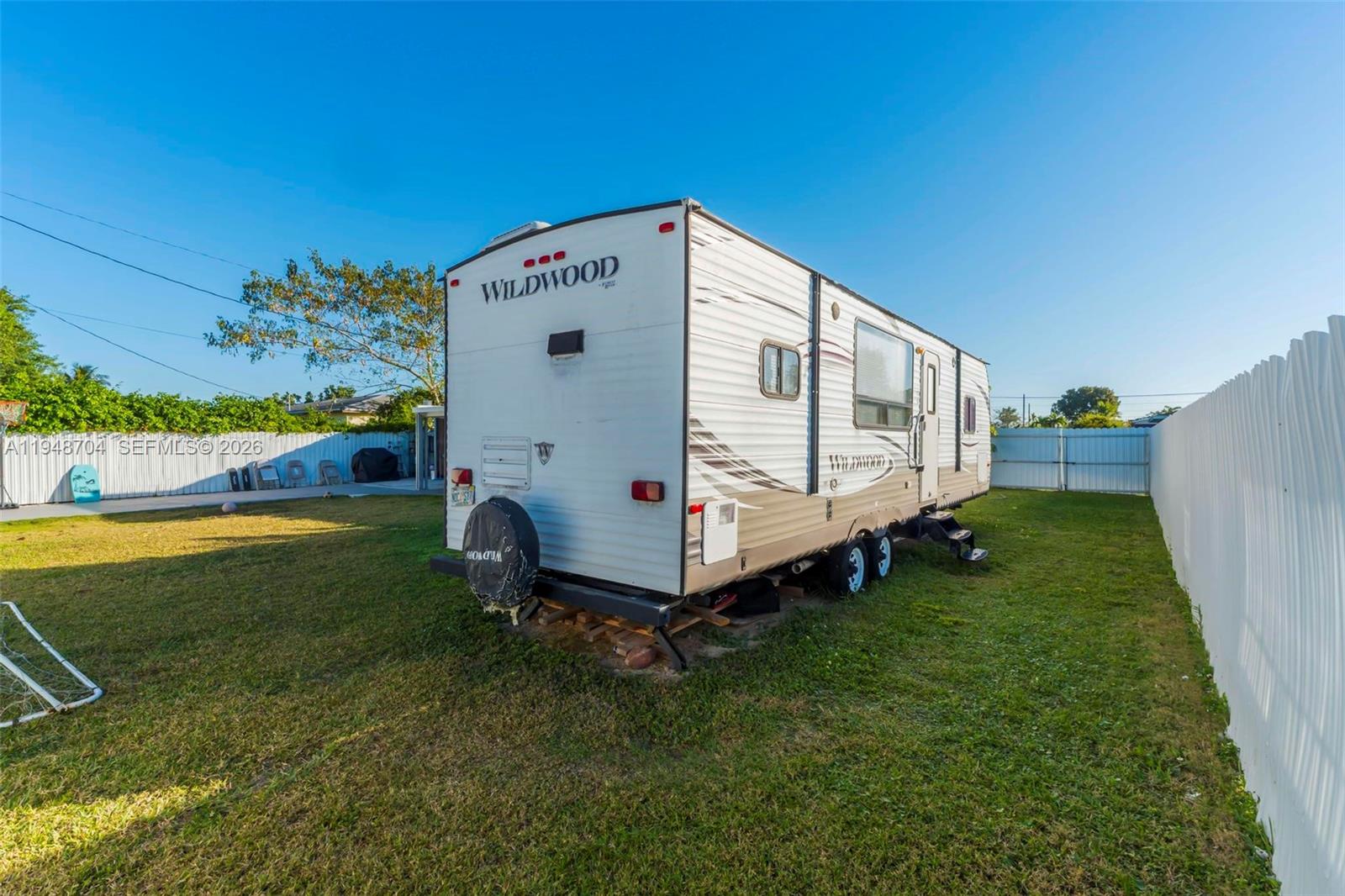 14860 Buchanan Street Miami, FL 33176 - Photo 18 of 27 a view of a backyard with a garden