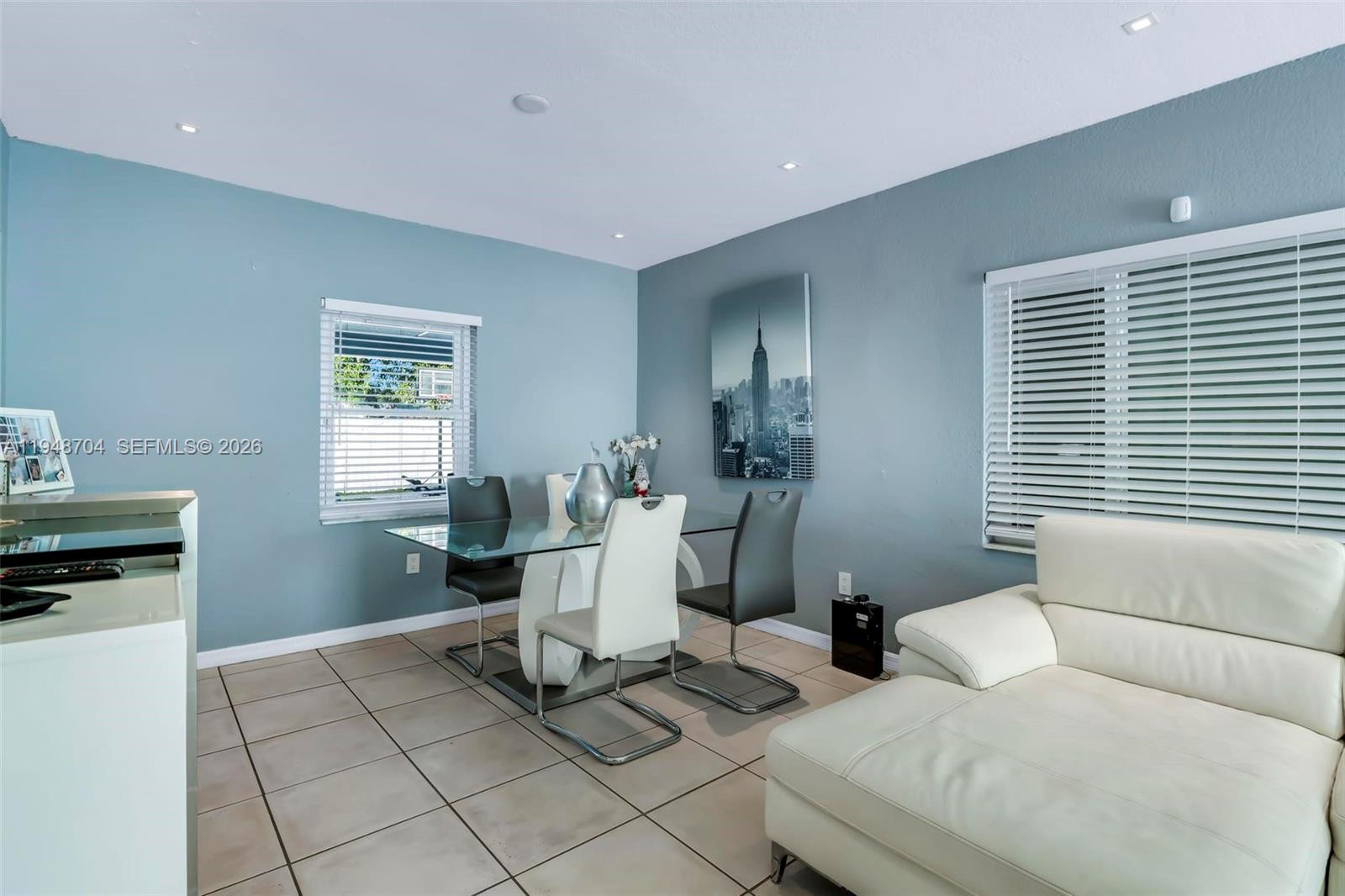 14860 Buchanan Street Miami, FL 33176 - Photo 5 of 27 a living room with furniture a window and a table