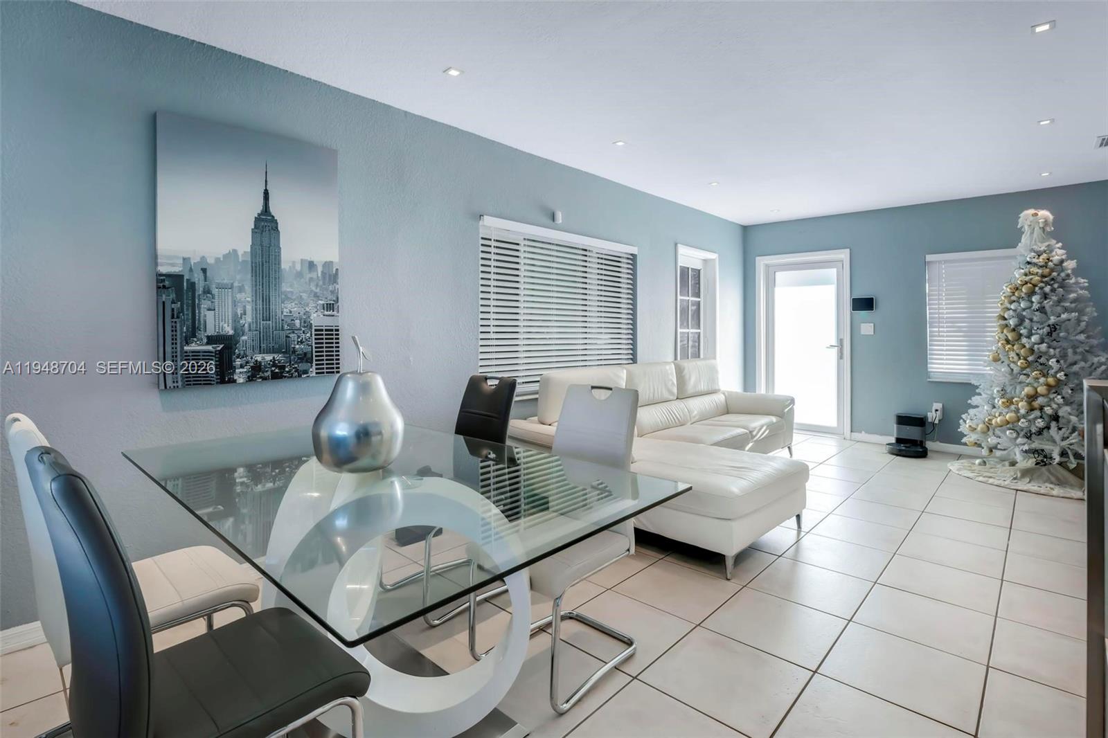 14860 Buchanan Street Miami, FL 33176 - Photo 6 of 27 a living room with furniture and a large window